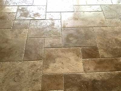 Travertine floor tiles installed by TLC Tile Pros Tampa